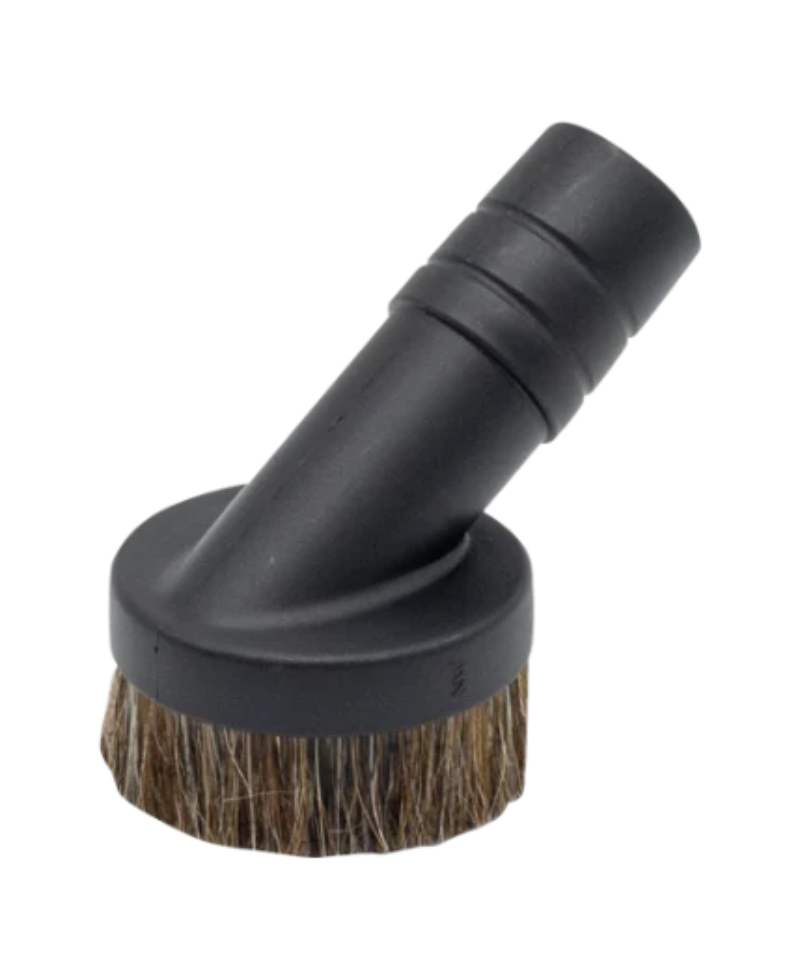 Black vacuum attachment with bristle brush on a white background